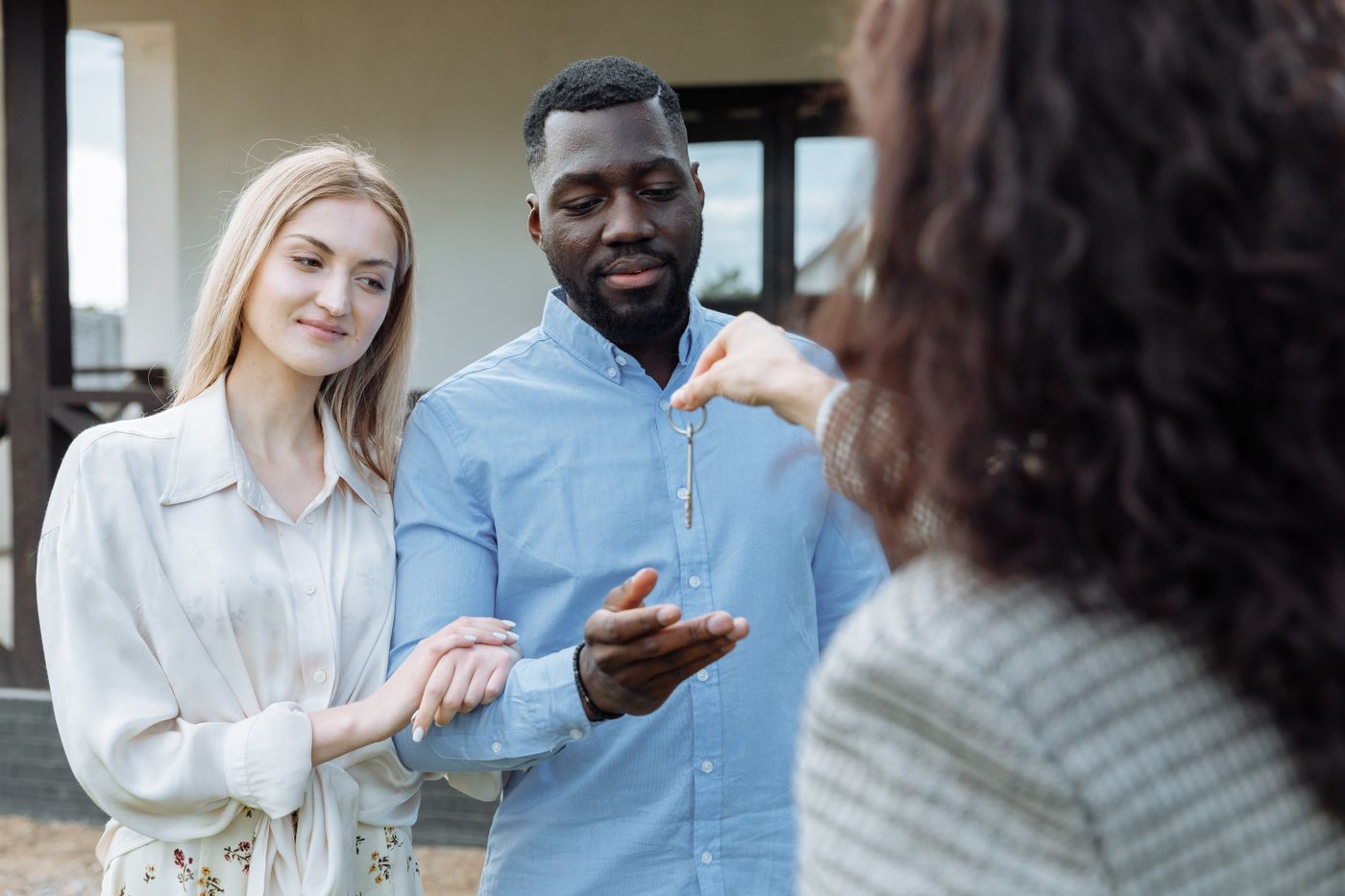 A couple receiving the keys to their new home